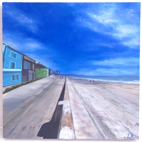 Mission beach boardwalk and sandy beach with vanishing point