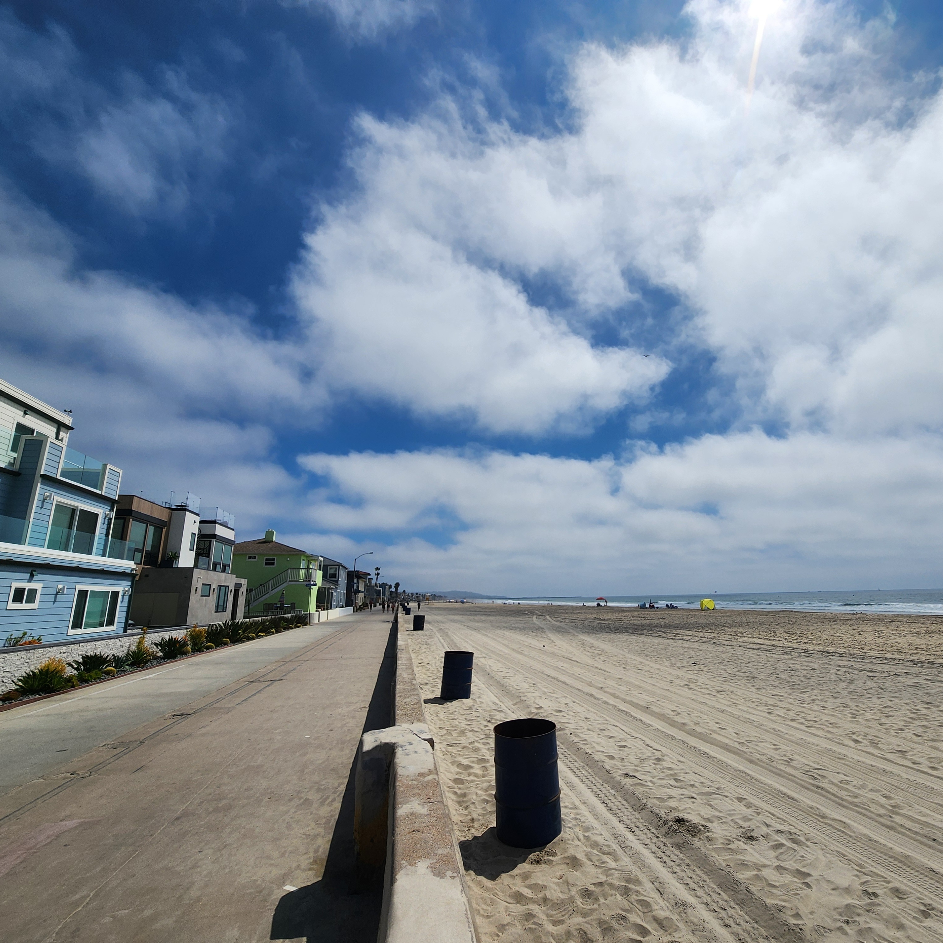 sunny boardwalk in mission beach, san diego, california
