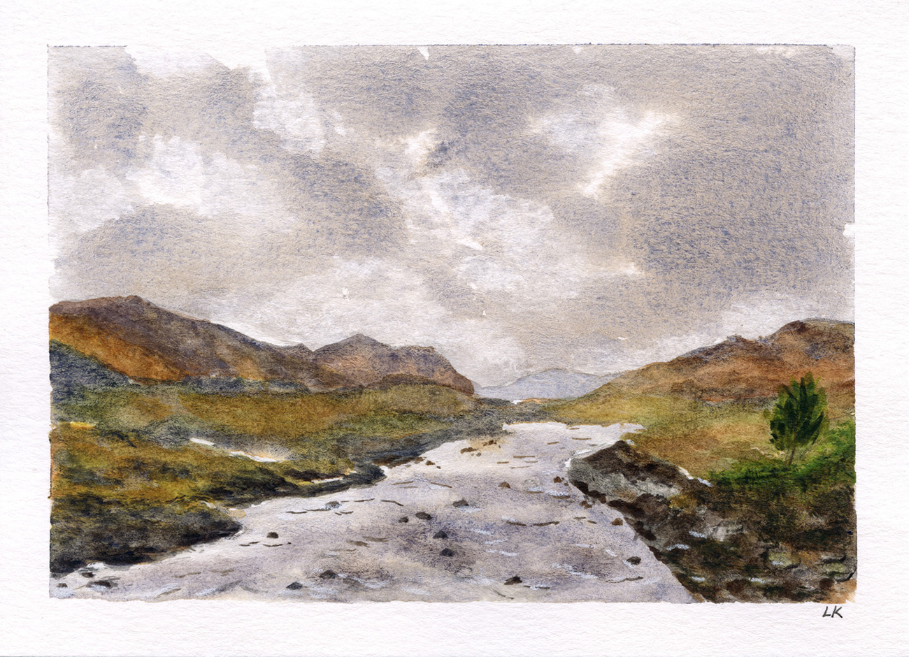 Original watercolor painting features a dramatic landscape of a rocky river running through a valley in the Scottish Highlands beneath a moody gray sky. Inspired by the landscape surrounding Sligachan Old Bridge on the Isle of Skye, Scotland.
